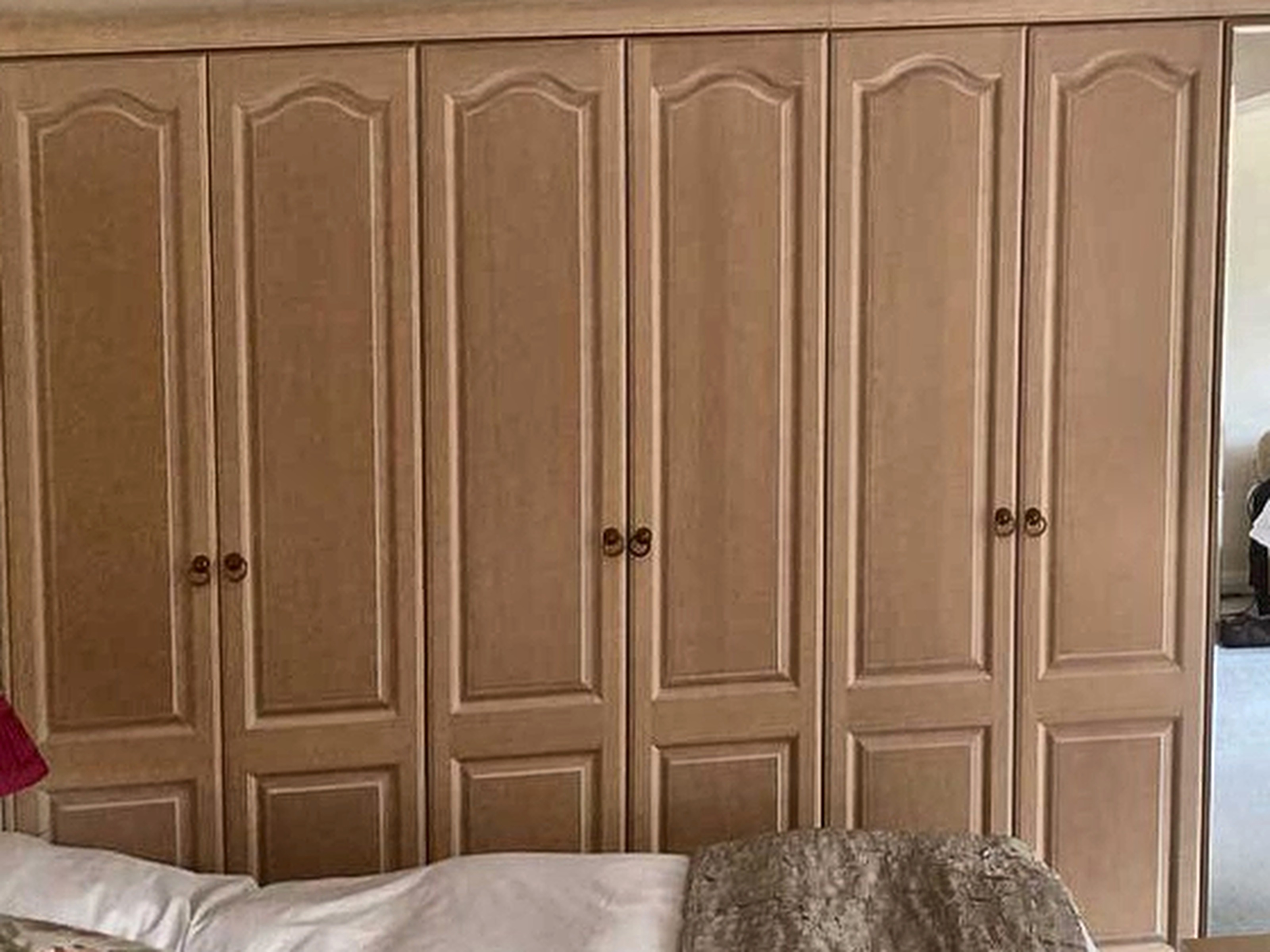 Fitted bedroom wardrobes in limed oak before respraying in Dublin