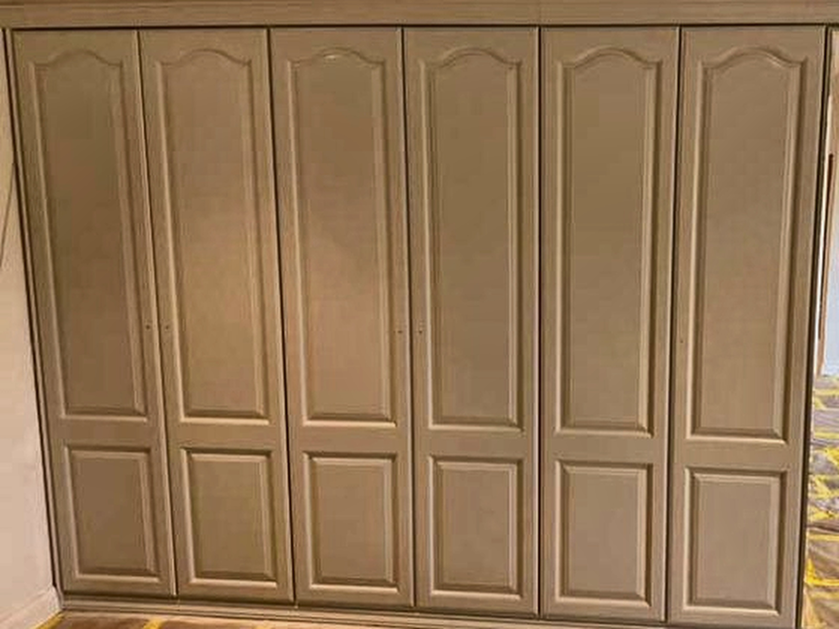 The same fitted wardrobes after a professional respray in Dublin